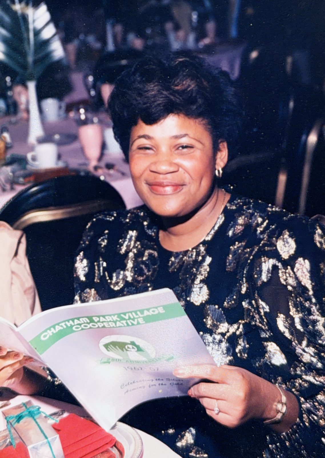 Donna Jean smiling at a Chatham Park Village Cooperative anniversary dinner